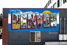 the word denver painted on the side of a building