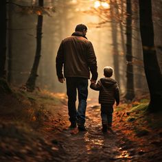 a father and son walking down a path in the woods at sunset, with the sun shining through the trees