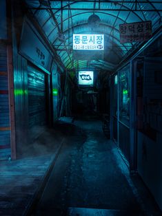 an alley way with neon signs in the dark