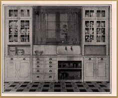 an old fashioned kitchen is shown in black and white