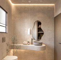 Japandi style bathroom with irregular wall mirror and limewash paint Balinese Bathroom, Wabi Sabi Bathroom, Bilik Air, Wabi Sabi Interior, Scandinavian Bathroom, Washroom Design, Salon Interior Design, Toilet Design, Bathroom Design Decor