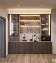 a modern kitchen with marble counter tops and wooden flooring, lighted by recessed lighting