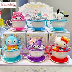 hello kitty tea cups and saucers are on display