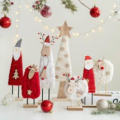 a group of christmas decorations sitting on top of a table