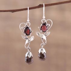 Capturing the romantic hues of dusk, this pair of Indian dangle earrings features five carats of smoky quartz that float below three carats of red garnet. Local artisans handcraft the leafy earrings of sterling silver, presented by Alok Jain. Moonstone Pendant Necklace, Pearl Bridal Jewelry, Leaf Motif, Ruby Pendant, Garnet Earrings, Stylish Earring, Moonstone Pendant, Smoky Quartz, Hook Earrings