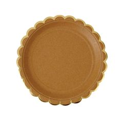 a brown paper plate with scalloped edges