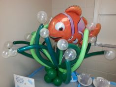 an inflatable clown fish sitting on top of a table