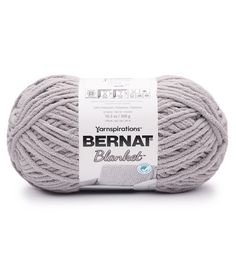 yarn ball with the label bernat blaukraut in grey on white background