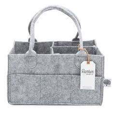 a gray felt bag with three compartments and a tag on the top of it that says,