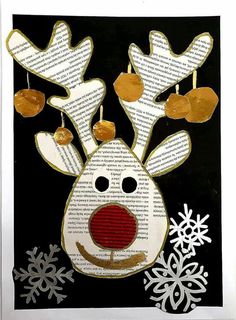 a reindeer made out of book pages with gold bells on it's antlers