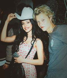 two young women standing next to each other