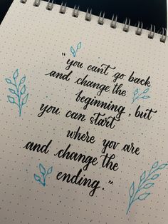 a notepad with writing on it that says you can't go back and change the beginning but you can start where you are and change the ending