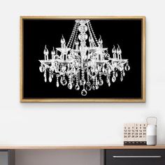 a chandelier hanging on the wall in a room