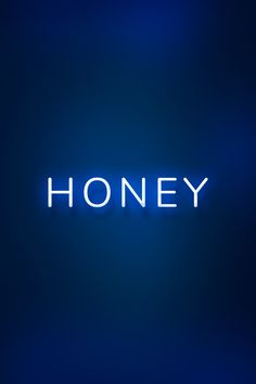 the words honey are lit up against a blue background