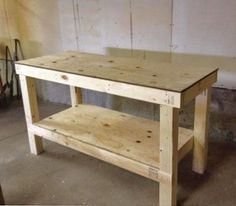 a workbench made out of wood in a garage