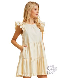 Indulge in a romantic affair with our Ruffles Mini Dress, crafted from soft cotton poplin fabric. The delicate ruffle details add a flirty touch, making you feel irresistible and alluring. Embrace your feminine side with this charming piece! Material: 97% Cotton, 3% Spandex Cotton Ruffle Hem Feminine Dress, Chic Cotton Dress With Ruffled Skirt, Chic Cotton Dresses With Ruffle Hem, Chic Cotton Dress With Ruffle Hem, Elegant Cotton Ruffle Dress For Spring, Spring Cotton Dress With Ruffled Skirt, Chic Beige Cotton Dress, Cotton Dress With Ruffle Hem And Sleeves, Feminine Cotton Flutter Sleeve Dress