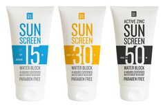 three sun screen sunscreens in different colors