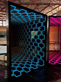 This image showcases an impressive infinity mirror design featuring two mirrored panels with a futuristic, tunnel-like effect. The panels, one in vibrant blue and the other in bright pink, create an optical illusion of endless depth, making it appear as though the patterned grid extends infinitely into the distance. The contrasting colors add a dynamic and visually striking effect, perfect for creating a modern, high-tech aesthetic. The infinity mirror design is ideal for use in gaming rooms, modern interior spaces, or as a statement piece in creative environments. Its ability to play with depth and light makes it an engaging and mesmerizing addition to any room. 🛠️ Expert Craftsmanship 📏 Customizable Sizes 🔨 Easy Installation Equipped with easy-to-hang mounting hardware, it can be effo Illusion Decoration, Pc Case Ideas, Cyberpunk Interior Design, Futuristic Decoration, Retro Futuristic Interior, Must Have Furniture, Futuristic Bathroom, Infinite Mirror, Infinity Mirror Room