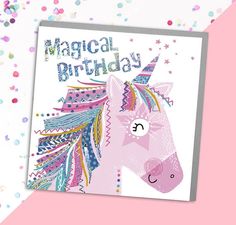 a pink unicorn birthday card with the words,'magic birthday'written on it