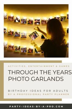 a woman is looking at photos on the wall with candles in front of her and text that