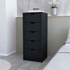 Crafted from high-quality materials and featuring a sleek and timeless design, this dresser is the perfect addition to any modern bedroom. With ample storage space in the form of multiple drawers, you can keep your clothes, accessories, and personal items organized and easily accessible. Elevate the look of your bedroom and enhance your storage solutions with this beautiful dresser. Latitude Run® Color: Black | Latitude Run® 5 Narrow Drawer Dresser, Lingerie Chest brownWood in Black | 42.45" H … Dresser Tall, Tall Chest Of Drawers, Dresser Wood, Accent Storage Cabinet, Lingerie Chest, Beautiful Dresser, 5 Drawer Dresser, Tall Chest, Drawer Design