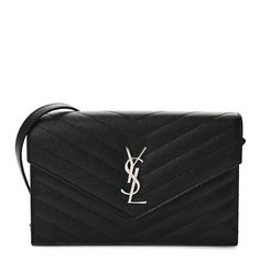 This is an authentic SAINT LAURENT Grain De Poudre Matelasse Chevron Monogram Envelope Chain Wallet in Black. This elegant wallet on a chain is crafted of finely pebbled chevron quilted leather in black. The shoulder bag features a removable waist-length gold chain shoulder strap with a shoulder pad and aged gold classic YSL emblem on the flap. This opens to a black leather interior with card slots, a zipper compartment, and patch pockets. Elegant Wallet, Chevron Quilt, Chain Wallet, Wallet Chain, Quilted Leather, Waist Length, Leather Interior, Shoulder Pads, Gold Chain