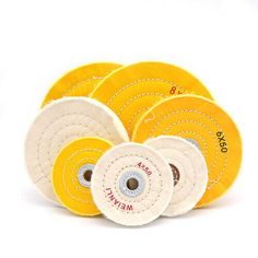 five yellow and white discs with the words dad written on one side, in front of them