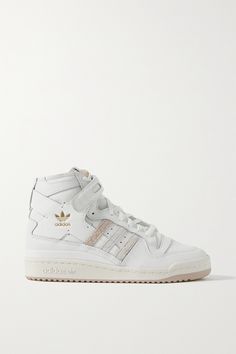 adidas Originals' 'Forum' sneakers debuted in 1984, and this latest white and beige iteration is a versatile adaptation of the original. Made from leather, they have a trio of suede stripes and the iconic VELCRO®-fastening ankle straps. High Top Adidas, Adidas High, Adidas Shoes Originals, White And Beige, Adidas Originals Women, Leather High Tops, Suede Lace, High Top Shoes, Ankle Straps