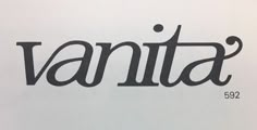 the word vanita written in black ink on white paper