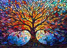 a stained glass tree with colorful leaves on it