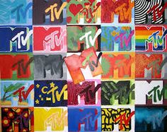 an art project with different colored letters and numbers on it's sides, including the letter m