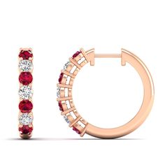 Introducing our exquisite ruby and diamond hoop earrings. These stunning earrings are the perfect blend of elegance and sophistication, making them a timeless addition to any jewelry collection. The vibrant red rubies and sparkling diamonds are meticulously set in a hoop design, creating a captivating and eye-catching piece. Metal: 14K Gold Setting Type: Prong Rhodium Finish: Yes, on White Gold Gemstone Details: Gemstone: Ruby Shape: Round Average Dimensions: 2.50 MM Quantity: 08 Average Cut: Ve Dance Jewelry, Hoop Design, Birthstone Gifts, Ring Pendant Necklace, Diamond Hoop Earrings, Stunning Earrings, New Jewelry, Sparkle Diamonds, Mens Wedding Bands