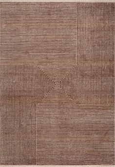 an area rug with brown and white stripes