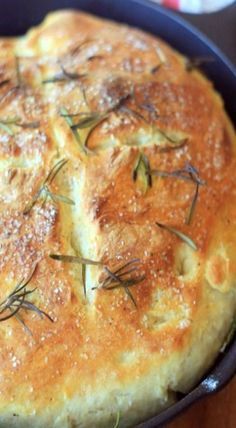 a close up of a bread in a pan on a table