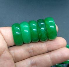 green jade ring1.Material:  dyed jade stone2.Size of bead: US 8# diameter: 18mm-18.3mmUS 9# diameter: 18.8mm-19.2mmUS 10# diameter: 19.8mm-20mm3.   this price is one bead4. fit make earring /brooch/pendant/necklace ect jewelry,5.If you have speical requests, I'll be happy to do it for you.6.Returns:I accept returns.1)Send me an email within 7 days and let me know the item is being returned.2)I will refund your money after we recieve our merchandise.3)Precondition:the item must be complete, unuse Jade Rings For Women, Green Jade Ring, Earring Brooch, Donut Ring, Verde Jade, Woman Ring, Man Ring, Ring Man, Talisman Necklace