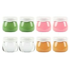 six jars filled with different colored liquids