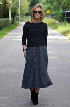 Trapezoidal button skirt made of 100% cotton. It has 2 comfortable pockets in the side seams. It looks good on most silhouettes and works great on different occasions. Size (total length / waist) US ---- UK --- EU/DE 4 ------ 6 ----- 34/XS (78/72) 6 ------ 8 ----- 36/S (78/76) 8 ----- 10 ---- 38/M (79/80) 10 ---- 12 ---- 40/L (80/84) 12 ----- 14 --- 42/XL (81/88) Dimensions in cm. 100% cotton Are you interested in a different color or size write to us Production method:sewn - own machinery - pro Autumn Skirt, Green Midi Skirt, Red Midi Skirt, Criss Cross Dress, Bow Tie Dress, Handmade Skirts, Summer Tunics, Skirt With Buttons, Button Skirt