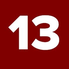 the number thirteen is shown in white on a red background, and it appears to be 13