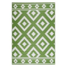 a green and white rug with diamonds on it