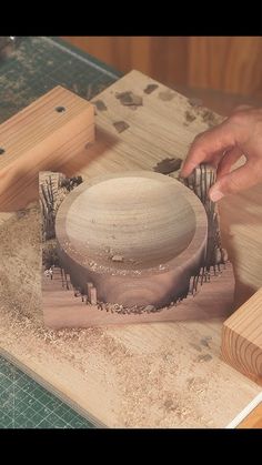 a person is working on a wooden object