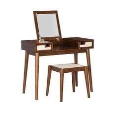 a wooden desk with a mirror and stool