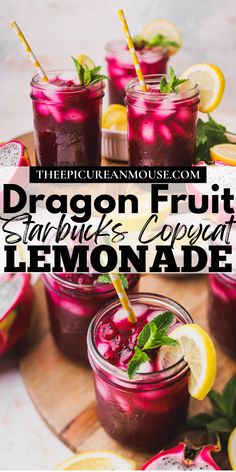 dragon fruit drink with lemon and mint garnish in mason jars on a wooden tray