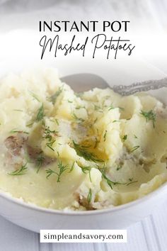 a white bowl filled with mashed potatoes on top of a table