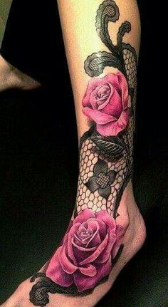 a woman's foot with pink roses and lace on the bottom part of her leg