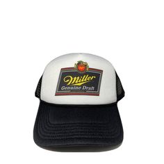 Miller Genuine Draft Beer Trucker Hat Mesh Hat Adjustable Cap Miller Hat Brand New Adults One Size Fits Most, Miller Beer Trucker Hat With Adjustable Closure In The Rear. Foam Hat With Poly Mesh Back. Color - Black / White Cap Features: 100% Polyester Front 100% Nylon Mesh Back 5-Panel Cap Seamless Foam Front Panel With Lining 8 Rows Stitching On Visor Matching Fabric Under Visor Adjustable Plastic Snap Vintage White Trucker Hat For Outdoor, Vintage White Flat Brim Hat, Vintage White Trucker Hat With Curved Brim, Vintage White Trucker Hat With Short Brim, White Trucker Hat With Short Brim, White Curved Brim Trucker Hat, Vintage White Trucker Hat For Beach, Casual White Trucker Hat With Short Brim, White Retro Snapback Hat With Short Brim