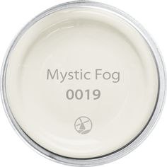 a white ceramic bowl with the words mystic fog on it