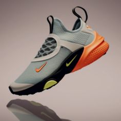 the nike air prestoe is in grey and orange