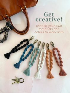 the keychain is made out of yarn and has tassels attached to it