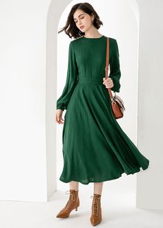 "New Arrivals Green midi Linen dress with pockets for spring autumn. DETAIL * 50% Linen, 50% cotton * Two side pockets * Long Lantern Sleeve * Small collar * Fit and flare dress * Back zipper closure * Perfect for summer, spring, autumn * Dry clean * The model is 175cm (5′9″) tall with a 80cm (31.5\") bust, 66cm (26\") waist. She is wearing in size XS CUSTOM MADE SERVICE If you * Change other color * Can't find your size in our size Chart * Change the length * Your Height is not Between 5'1\" - Green A-line Midi Dress, Green Linen Dress Solid Color, Green A-line Midi Dress For Fall, Green A-line Solid Color Midi Dress, Dark Green Midi Length Spring Dress, Dark Green Midi Length Dress For Spring, Modest Green A-line Dress, Green Solid Color Midi Length Dress, Spring Dark Green A-line Dress