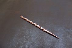 "This is a hand forged solid copper hair stick. It makes a beautiful addition to any outfit or makes an awesome gift! Each one of these metal hair sticks are handmade on a coal forge and worked over an anvil by artist blacksmith Adam Rhein. No two pins are identical because they are individually handmade. Depending on your hair length and thickness, this stick will work great for several hairstyles. Includes: One Hair Stick. Check out some of my other awesome products! https://www.etsy.com/shop/ Coal Forge, Copper Diy, Twist Hair, Metal Hair, Copper Hair, Hair Stick, One Hair, Fun Diy Crafts, Hair Length